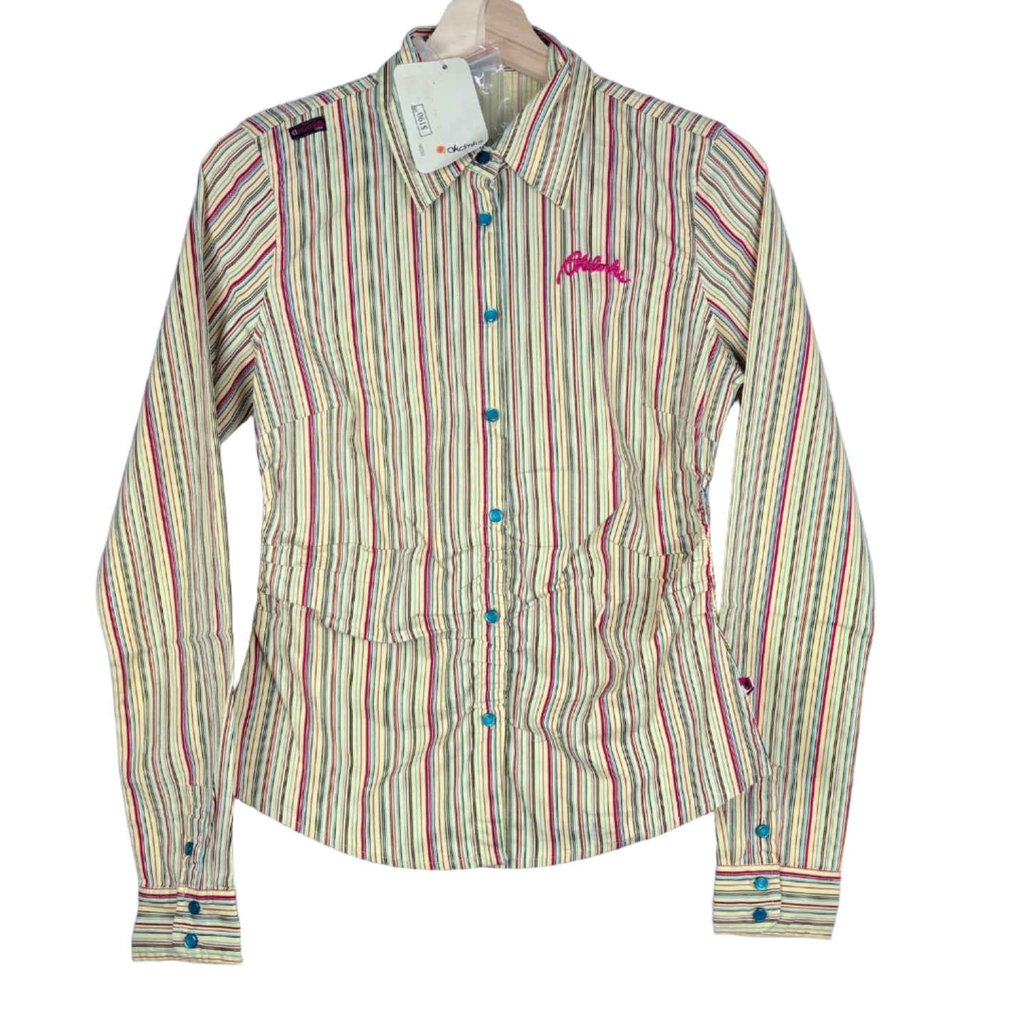 Striped shirt with colorful buttons on a white background