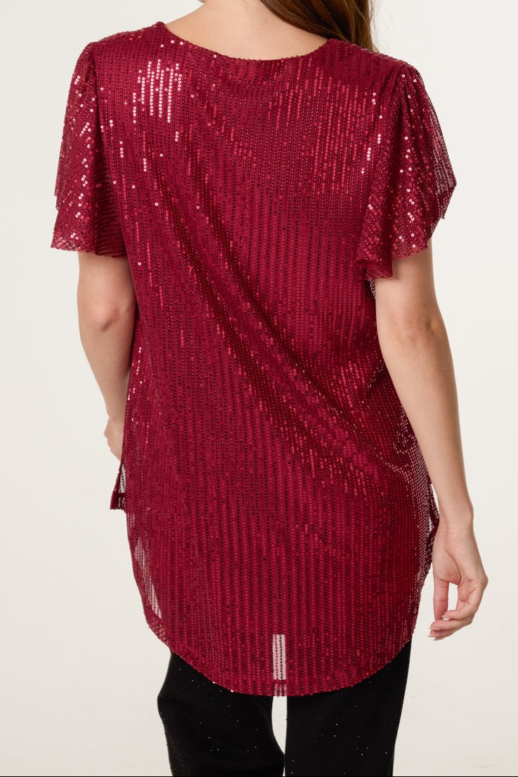 Red Top shown from the back on a model