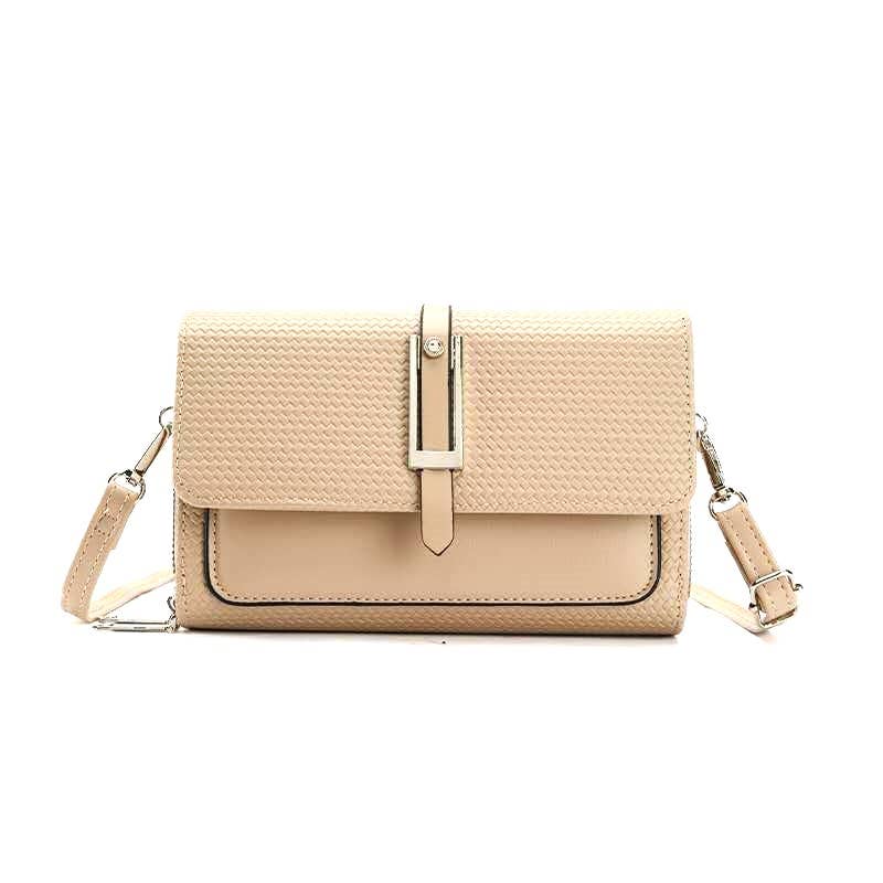 Beige woven handbag with a strap on a white background
