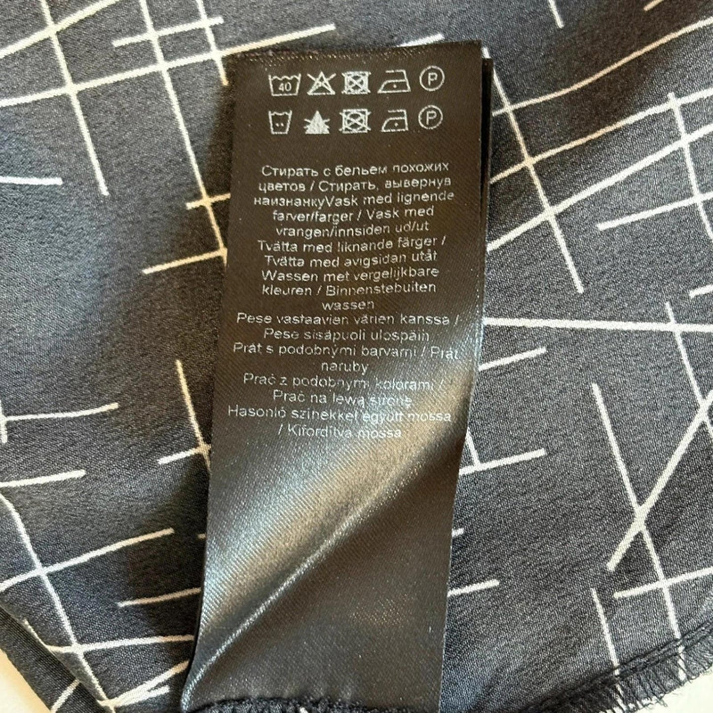 Clothing label on a textured fabric background