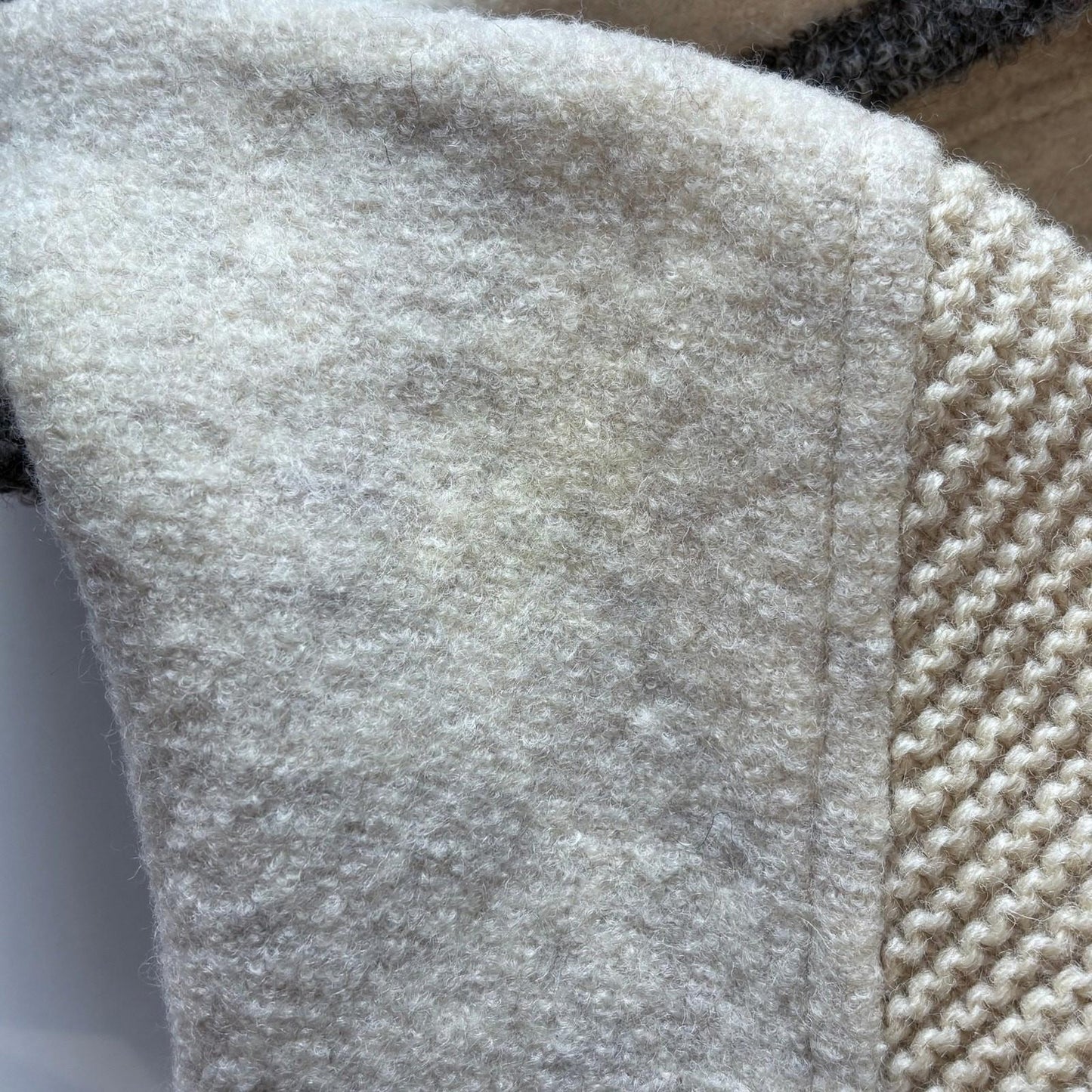 Close-up of textured fabric with a slight mark.