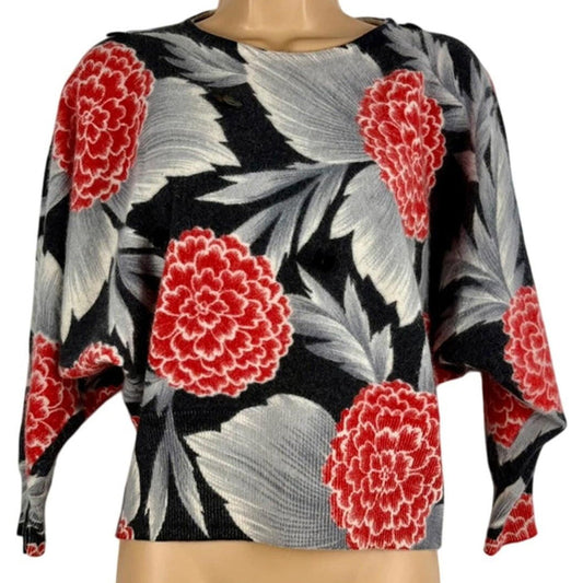 Floral patterned top on a mannequin with a white background