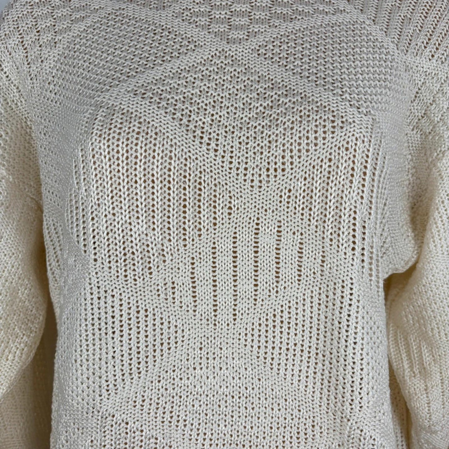 Close-up of a textured beige sweater