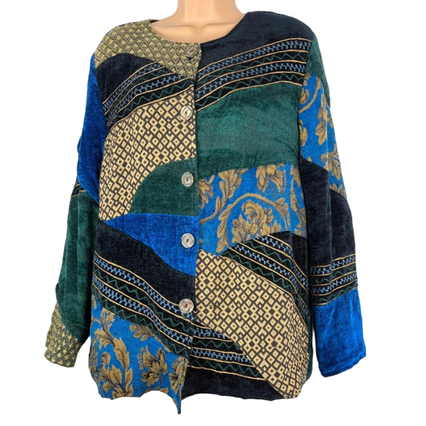 Mannequin wearing a patterned sweater with blue, green, and gold colors on a white background