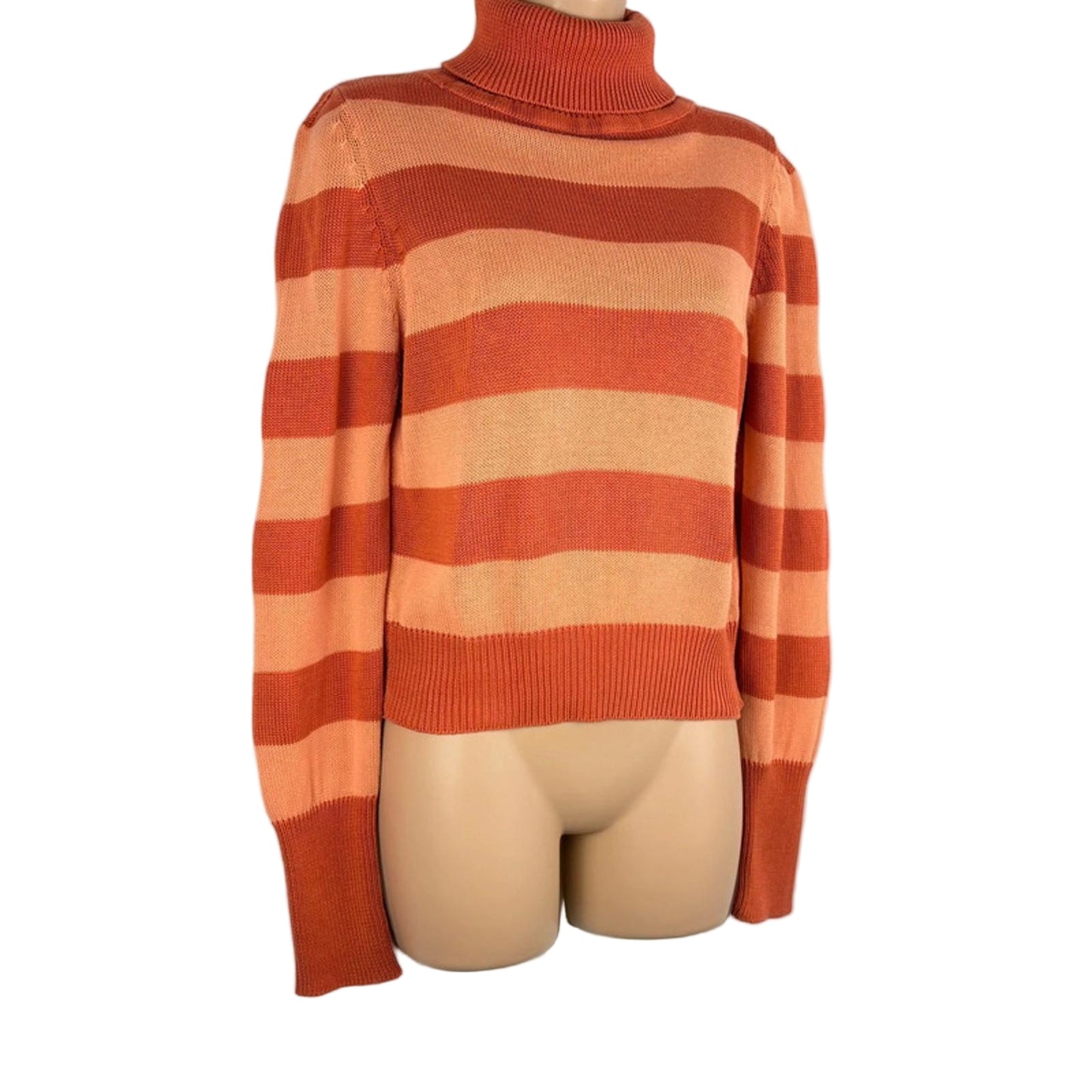 Orange and beige striped sweater on a mannequin against a white background