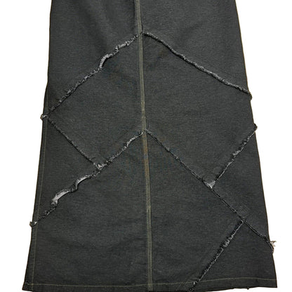 Black denim skirt with distressed edges on a white background