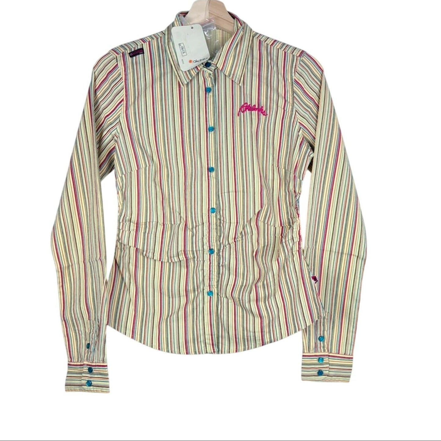 Striped shirt with colorful buttons on a white background