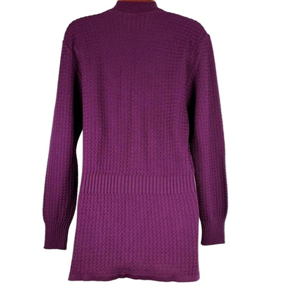 Purple sweater on a wooden hanger against a white background