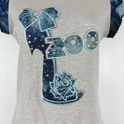 Gray shirt with decorative elements including a bow, 'Zoo' text, and rose design on a white background