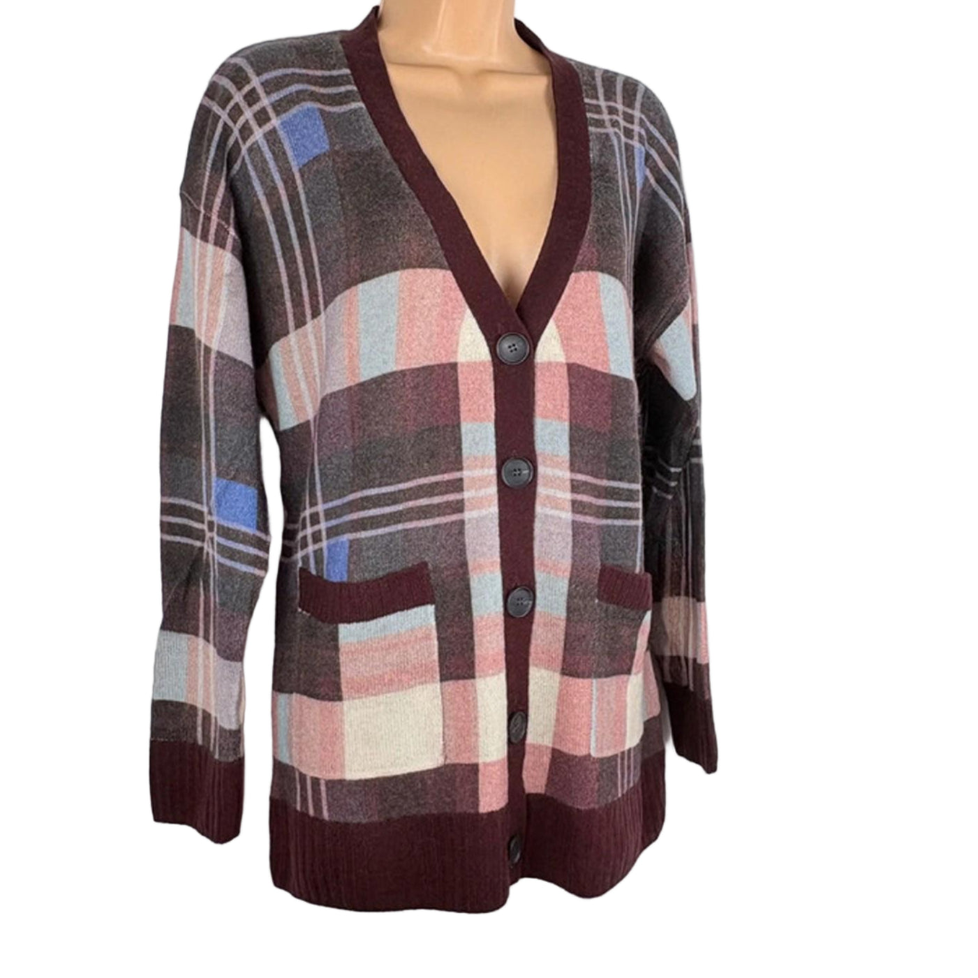 Plaid cardigan on a mannequin against a white background