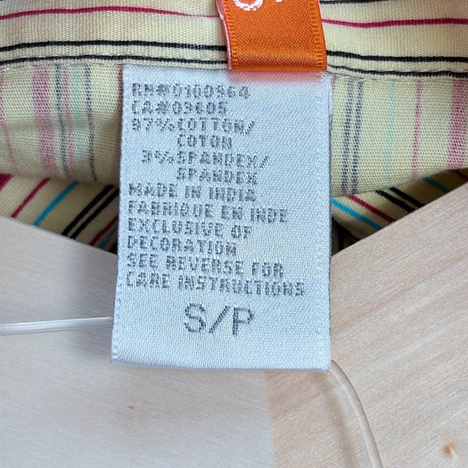 Textile label on a fabric with a striped background
