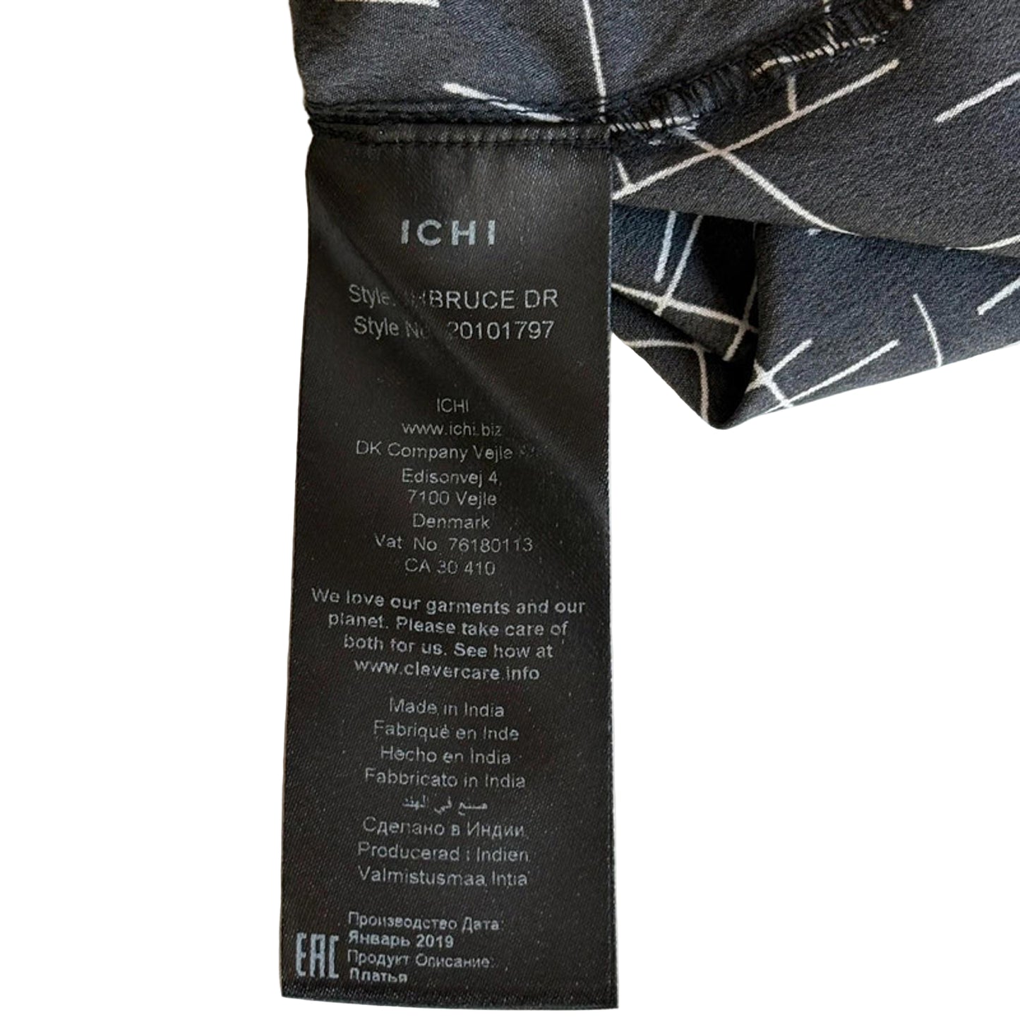 Clothing label with brand information on a garment