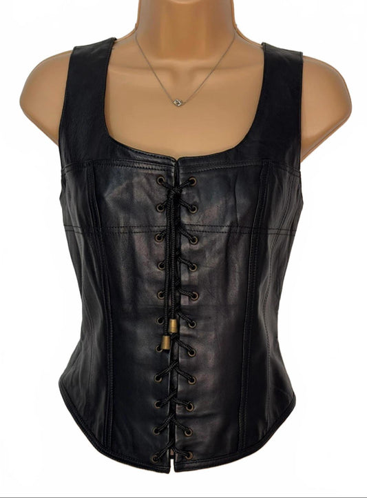 Black leather corset on a mannequin with a white background