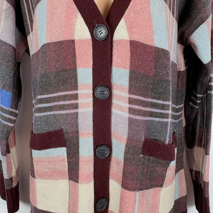 Plaid cardigan with buttons on a white background