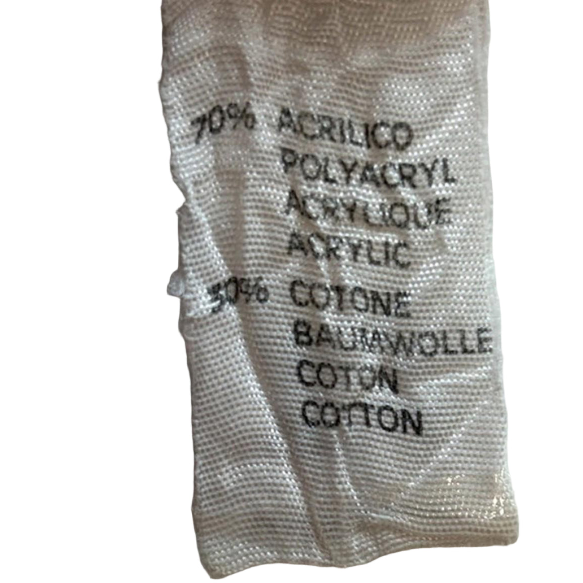 Fabric label with material composition on a white background