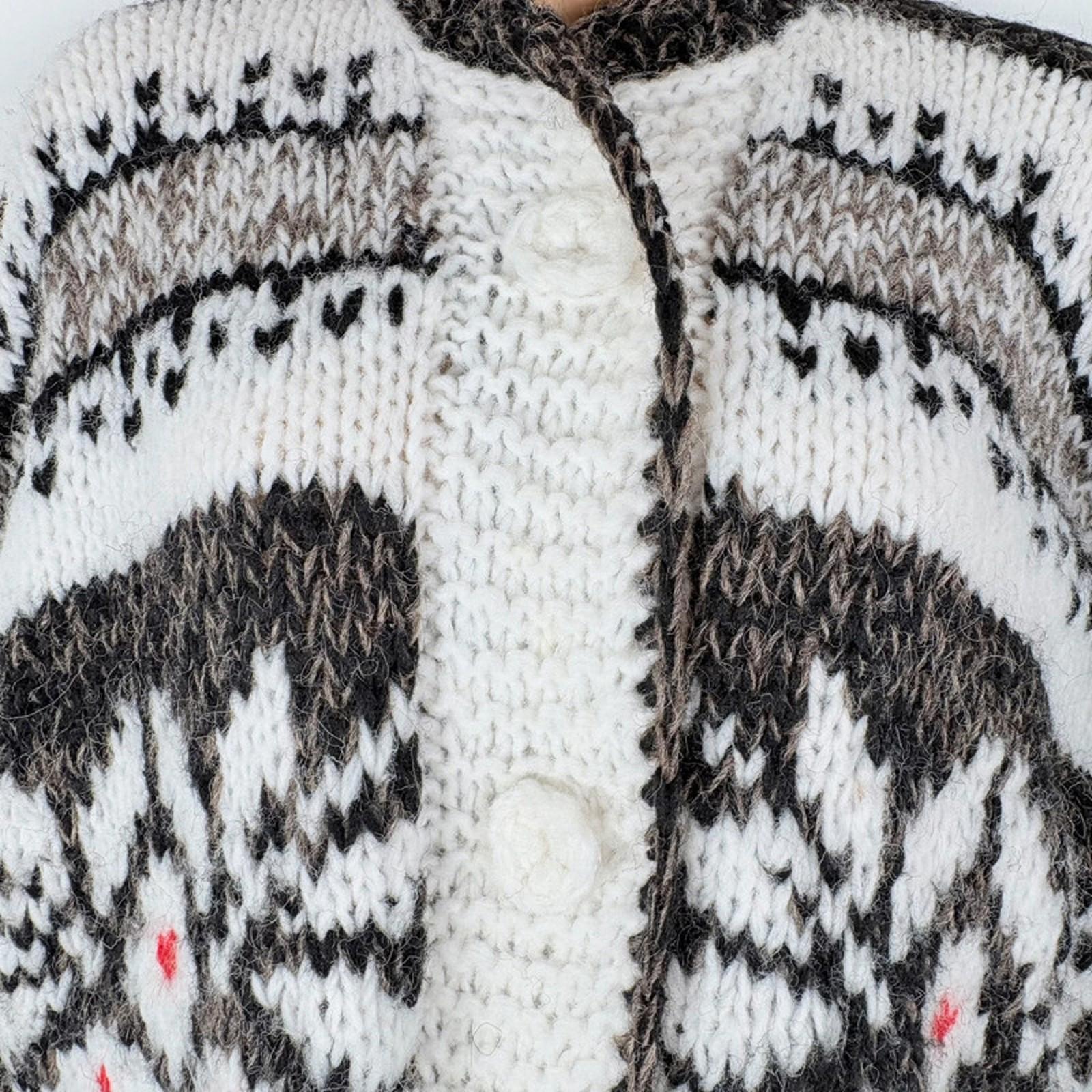 Close-up of a knitted garment with a patterned design.