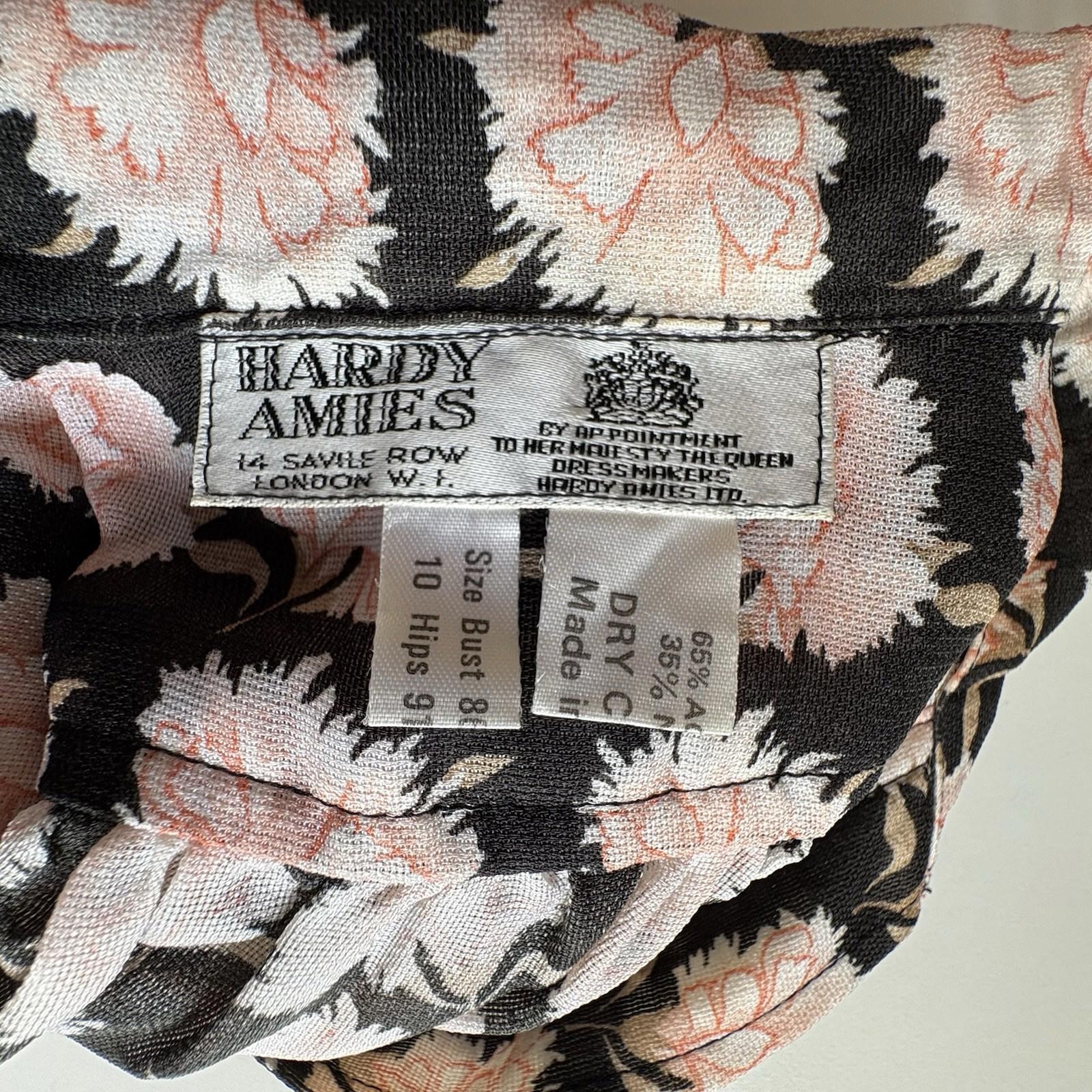 Floral fabric with Hardy Amies label and size information