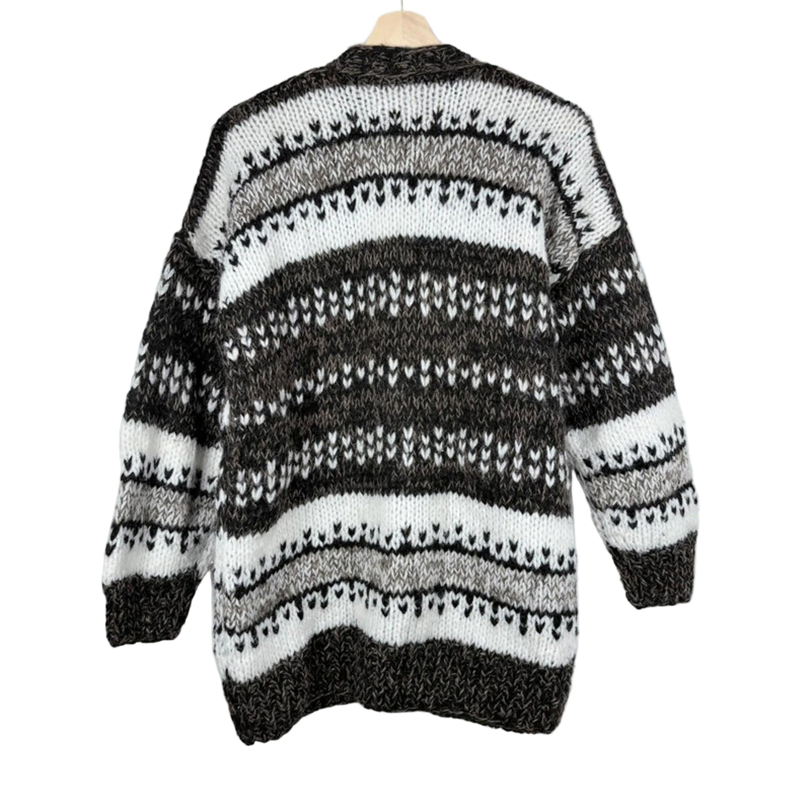 Black and white striped sweater on a mannequin against a white background