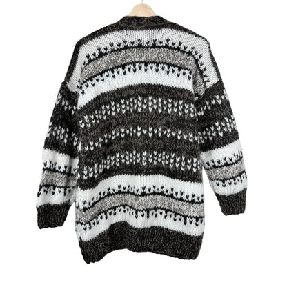 Black and white striped sweater on a mannequin against a white background