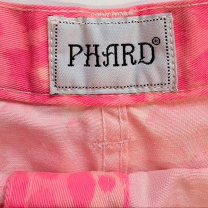 Close-up of a pink garment with a 'PHARD' label.
