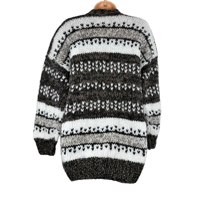Black and white striped sweater on a mannequin against a white background