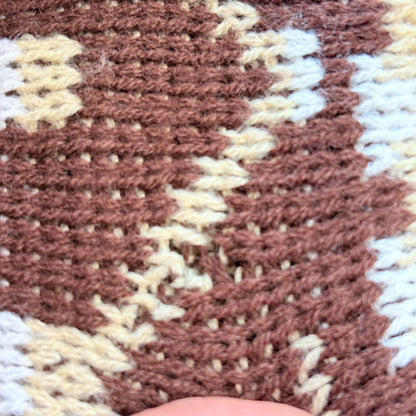 Close of brown jumper 