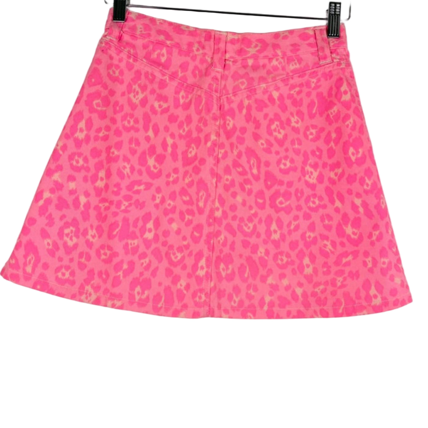 Pink skirt with a subtle pattern on a hanger against a white background