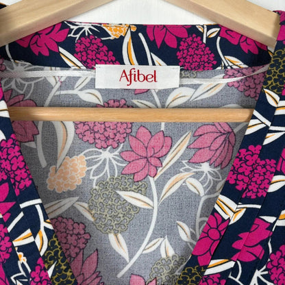Floral-patterned fabric with 'Afibel' label on a hanger