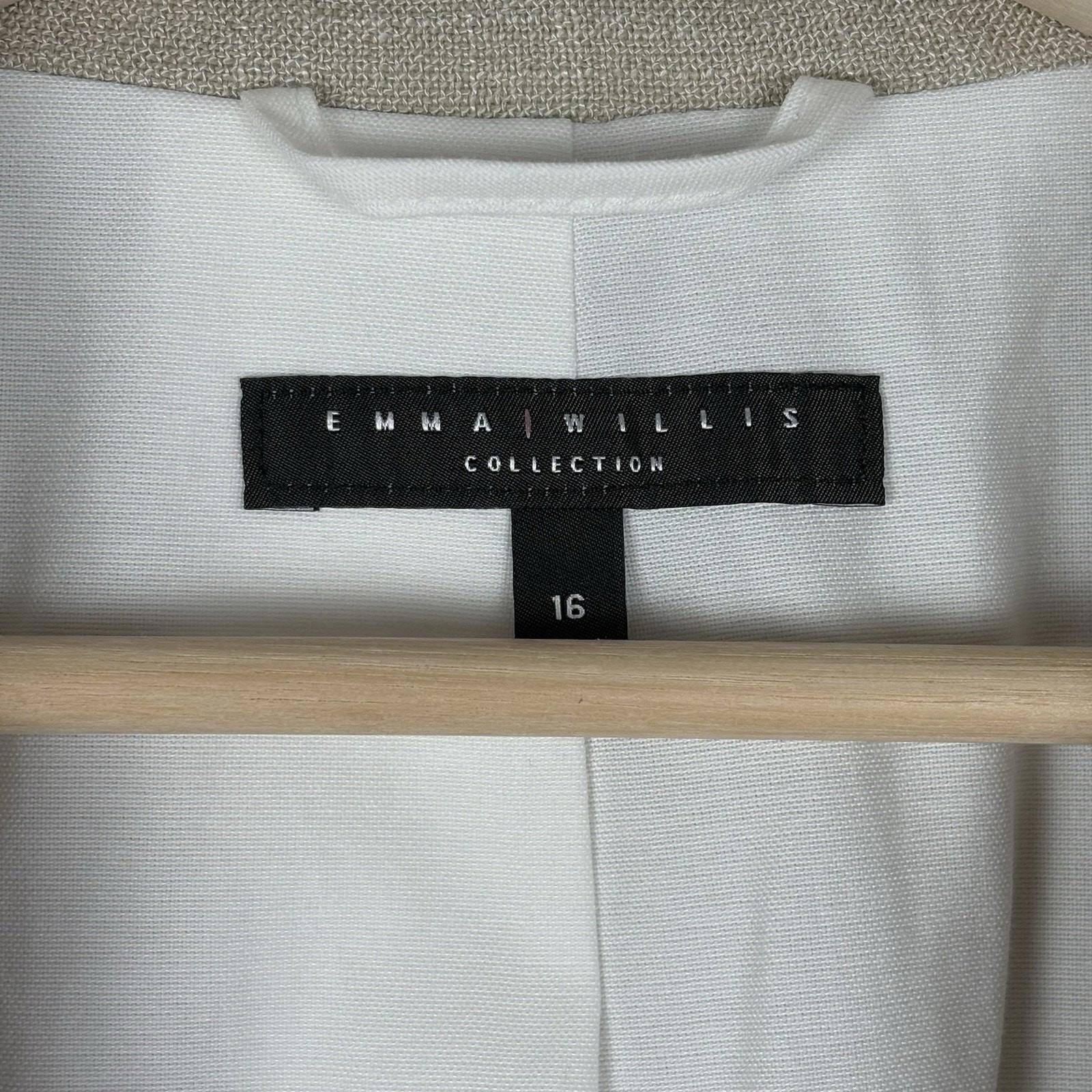 Label with 'Emma Willis Collection' on a white garment