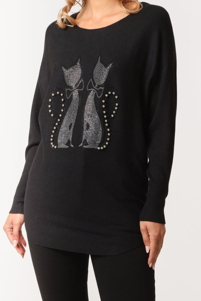 Black sweater with cat design on a white background