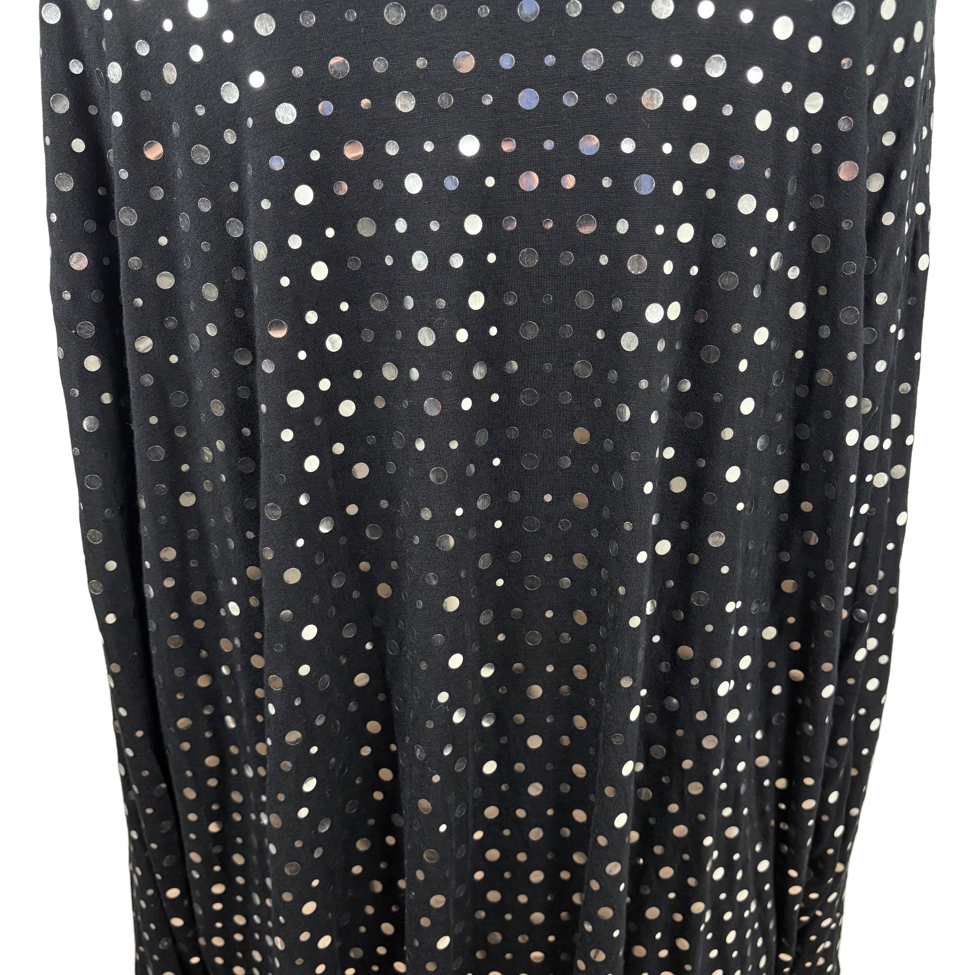 Close up of lack cardigan with sliver dots