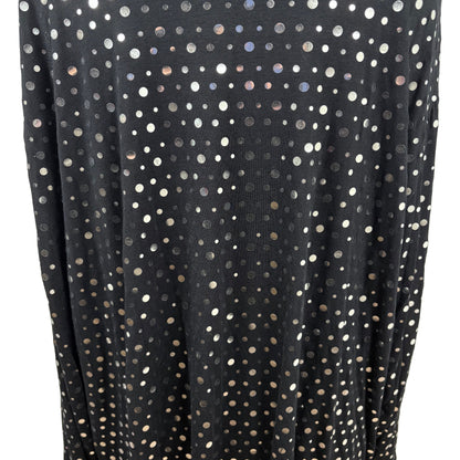 Close up of lack cardigan with sliver dots