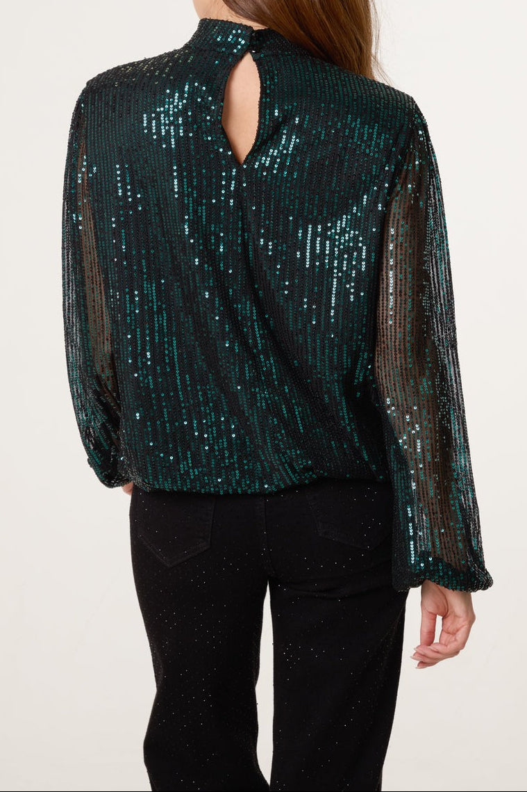 Back of green sequin top on a model