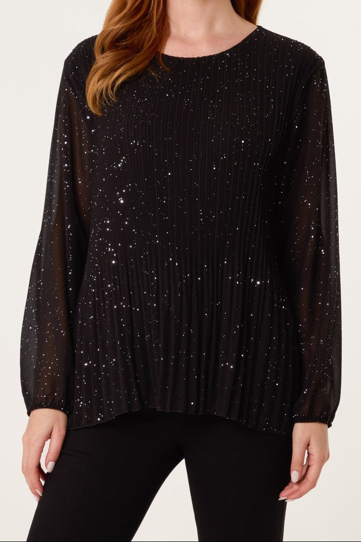 Black glittery sweater worn by a person on a white background