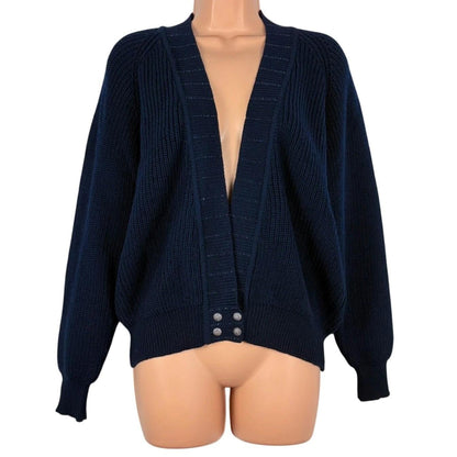 Navy blue cardigan on a mannequin against a white background