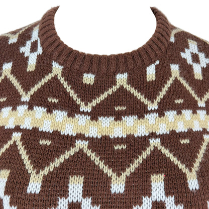 Brown knitted sweater with geometric pattern on a mannequin