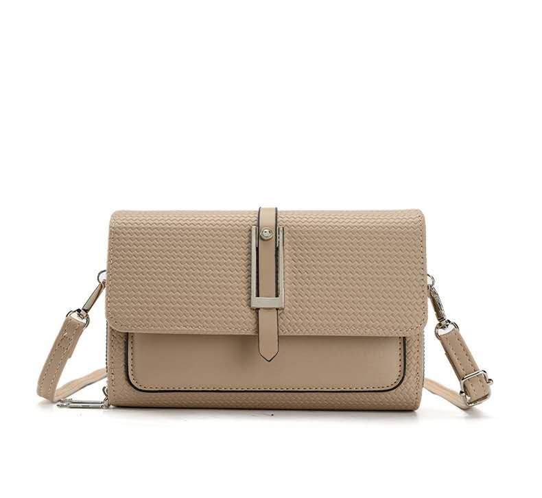 Beige handbag with a strap on a white background