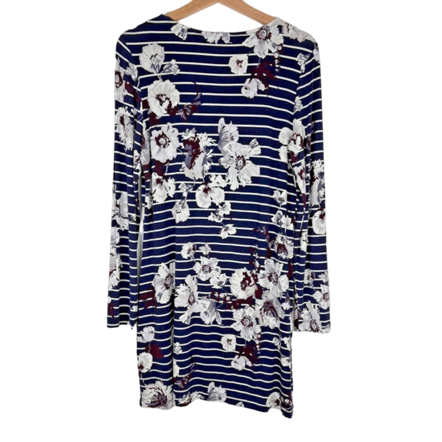 Navy striped dress with floral pattern on a hanger against a white background