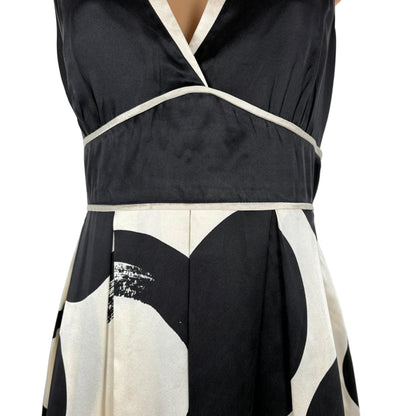 Black and white dress with abstract pattern on a plain background