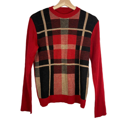 Red sweater with plaid pattern on a hanger against a white background