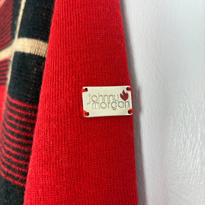 Red sweater with a 'Johnny Morgan' tag on a white background