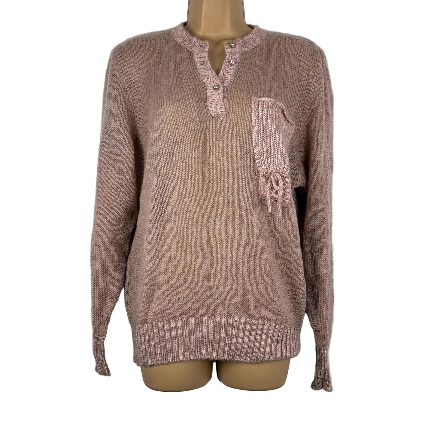 Pink sweater with a pocket on a mannequin against a white background