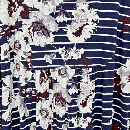Close up of Navy striped fabric with white floral patterns