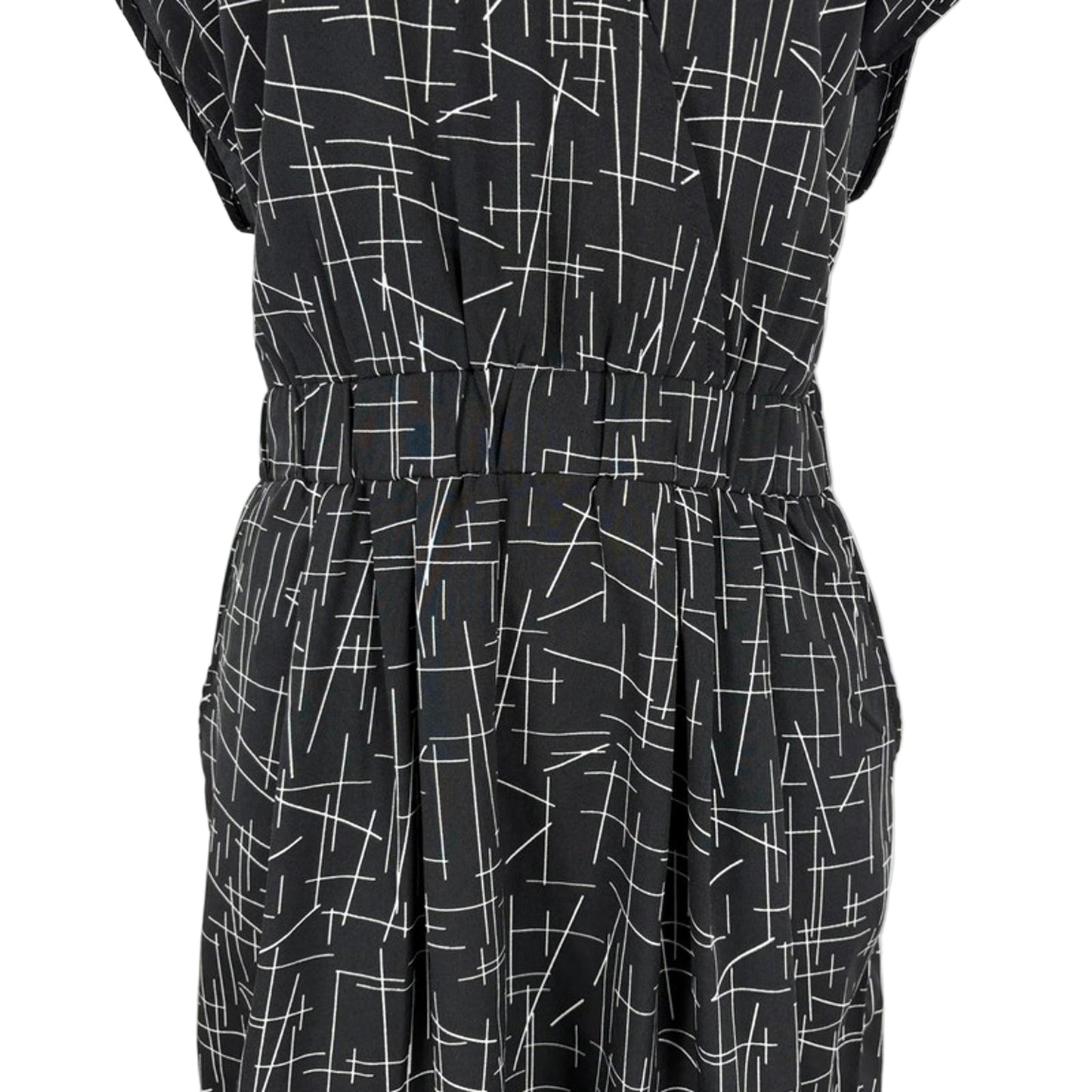 Black dress with white geometric pattern on a white background