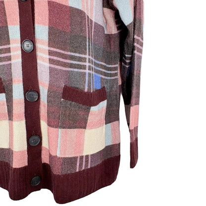 Plaid patterned cardigan with buttons on a white background