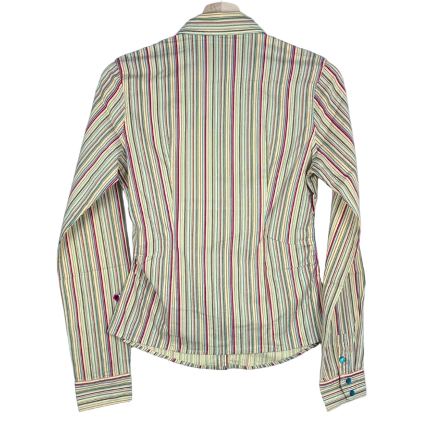 Striped shirt on a hanger against a white background