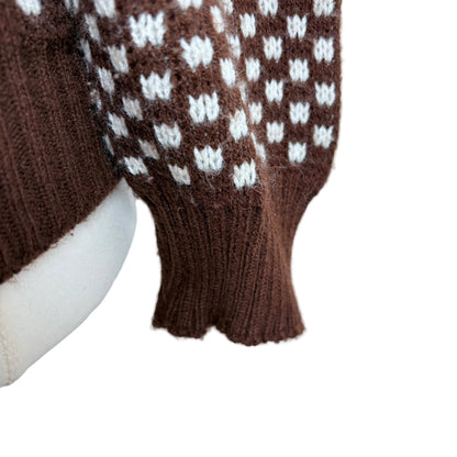 Brown jumper close up of sleeve