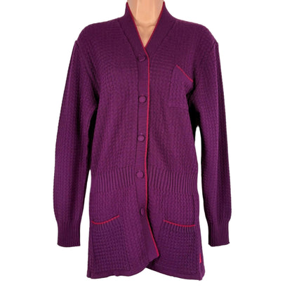 Purple cardigan on a mannequin against a white background