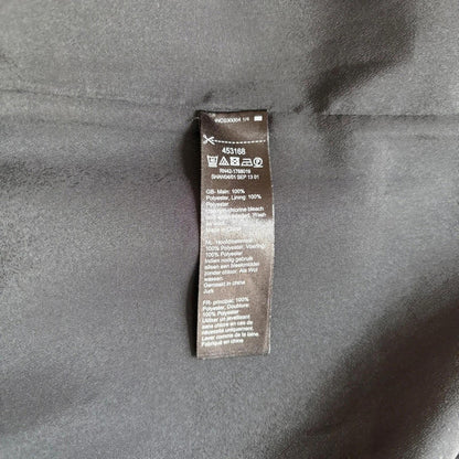 Clothing label on a gray fabric background