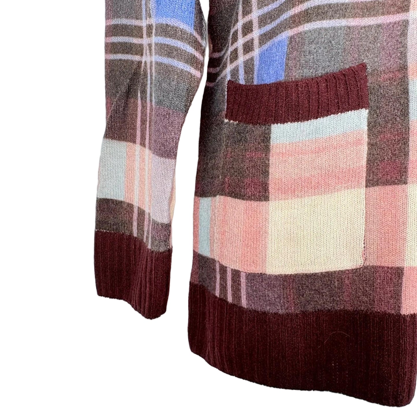 Plaid patterned sweater with a pocket on a white background